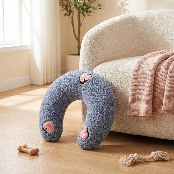 PawCalm pillow in a bright living room